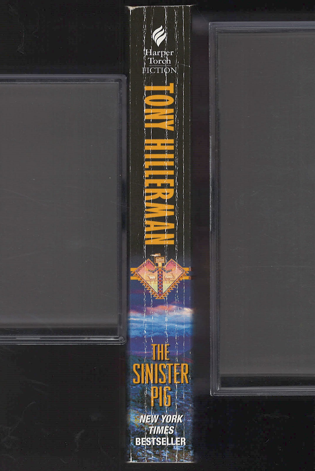 The Sinister Pig by Tony Hillerman spine