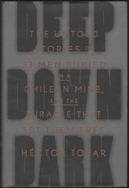 Front cover of Deep Down Dark by Héctor Tobar with a dark gray background and gold text.