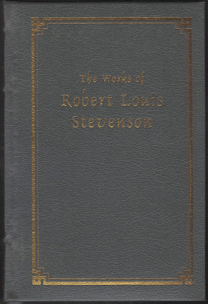 Gray leather-bound book with gold embossed text on the cover