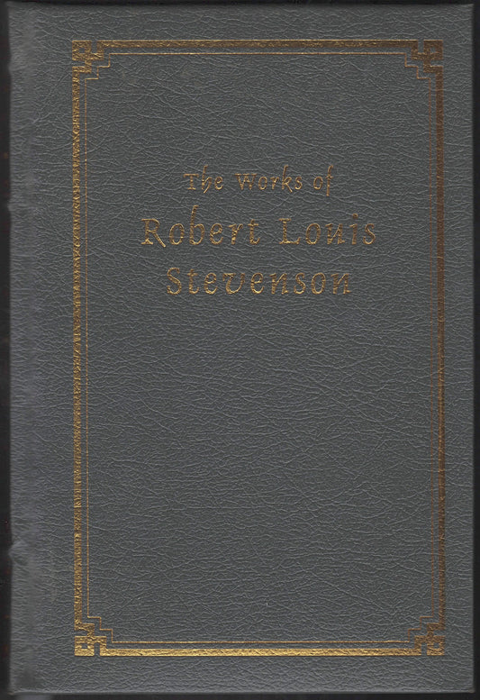 Gray leather-bound book with gold embossed text on the cover