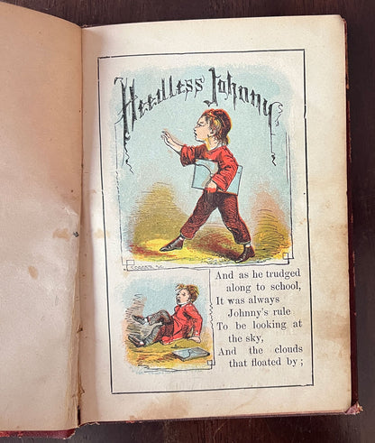 Open book with illustrations of a child in a red coat.