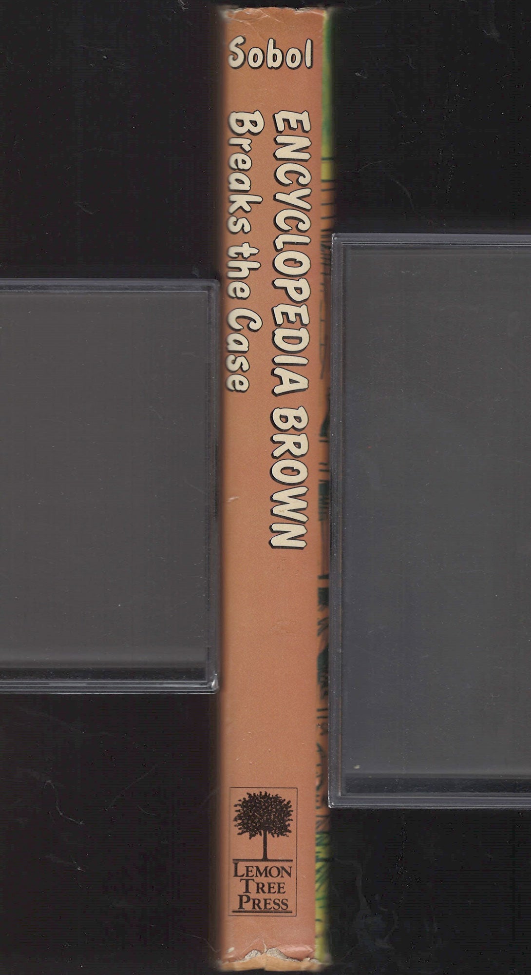 Encyclopedia Brown Breaks the Case by Donald Sobol spine