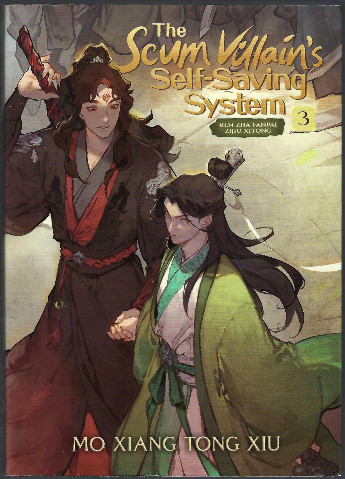 Front cover of The Scum Villain's Self-Saving System Volume 3 by Mo Xiang Tong Xiu, featuring two illustrated characters in traditional robes against a warm-toned background.