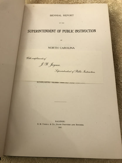 Title page with laid in dedication